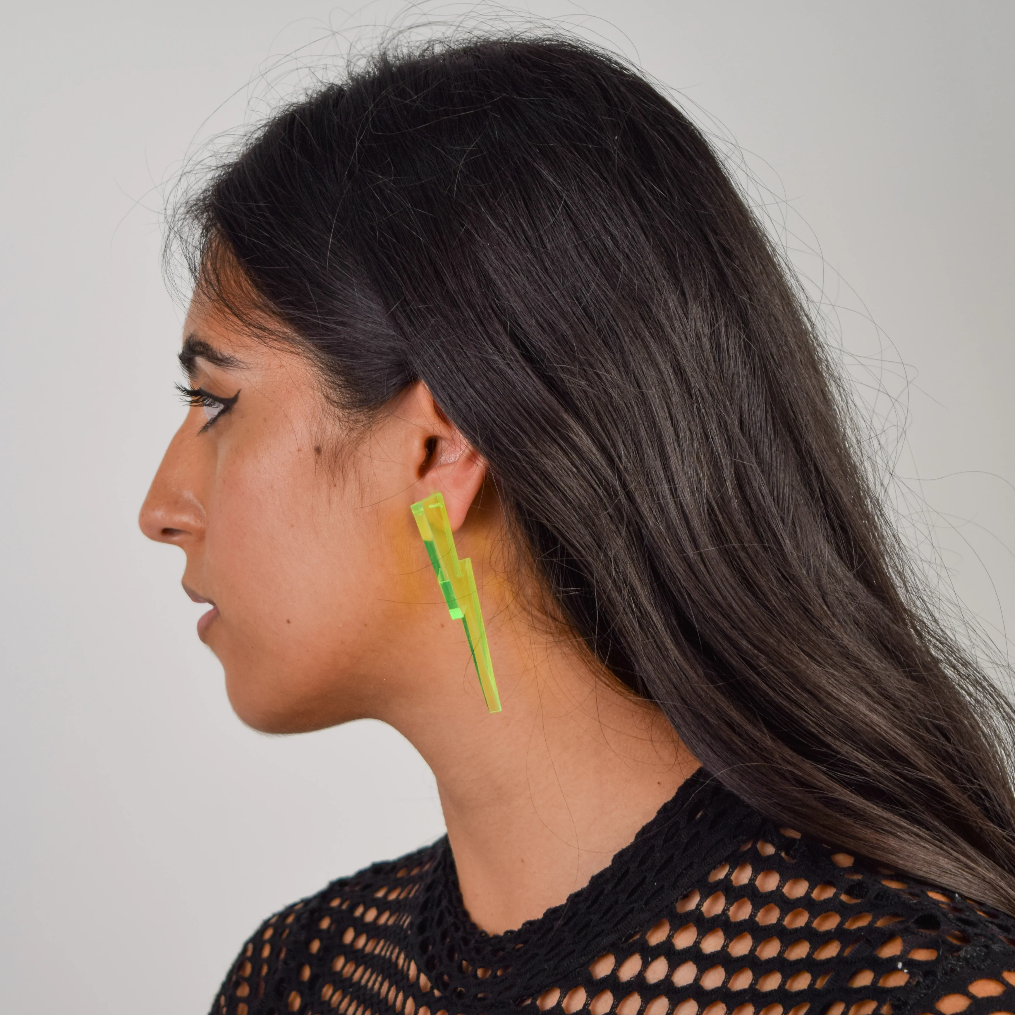 Chunky Statement Lightning Bolt Earrings in Black Light Reactive Clear Green - Image 5